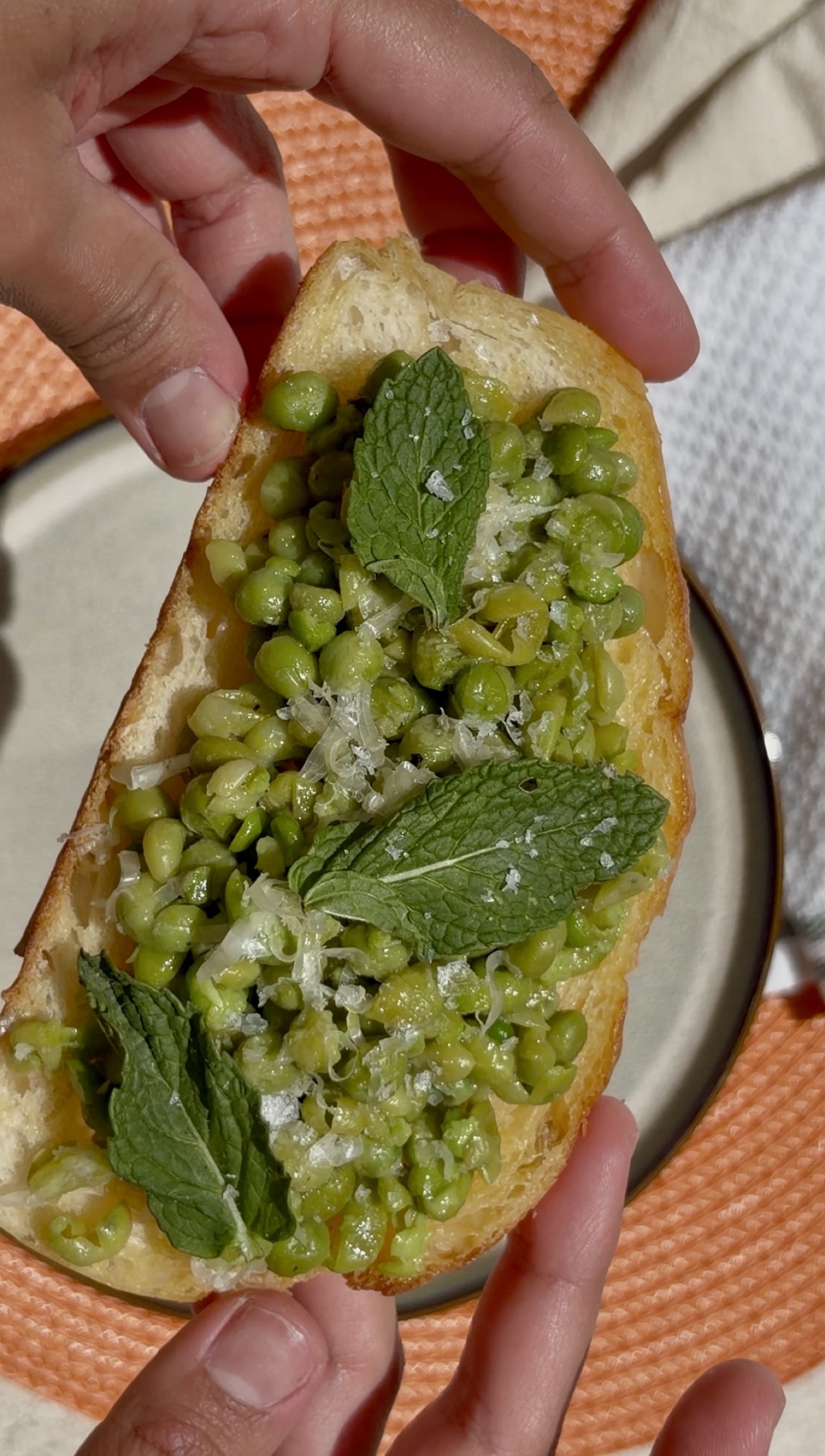 Pea and mint crostini on golden sourdough