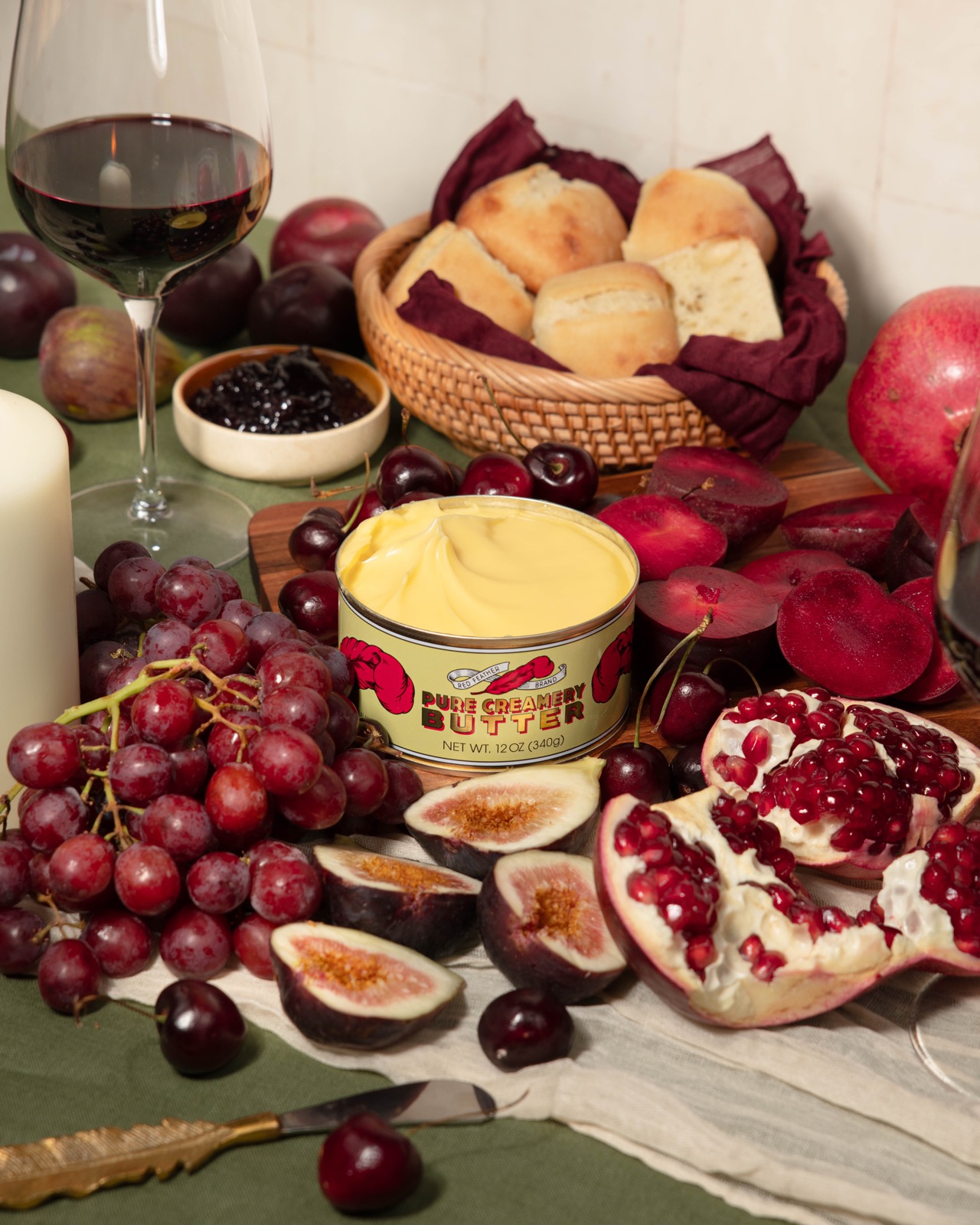 A table set with bread, butter and small dishes